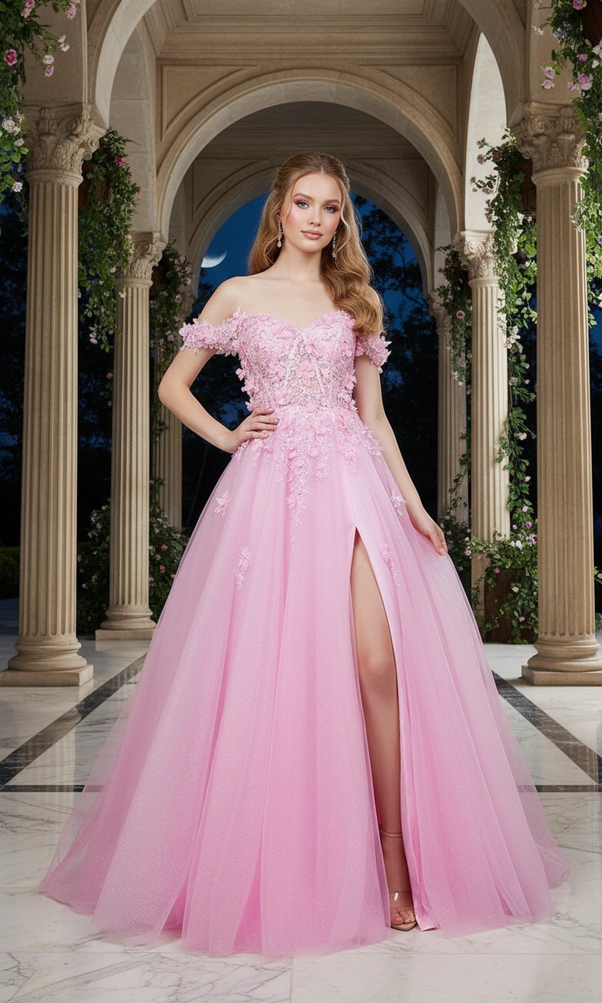 A woman stands in a marble hallway, surrounded by columns and greenery, wearing the pink Cinderella Couture 8403J long prom dress with off-the-shoulder 3D floral details and a thigh-high slit.